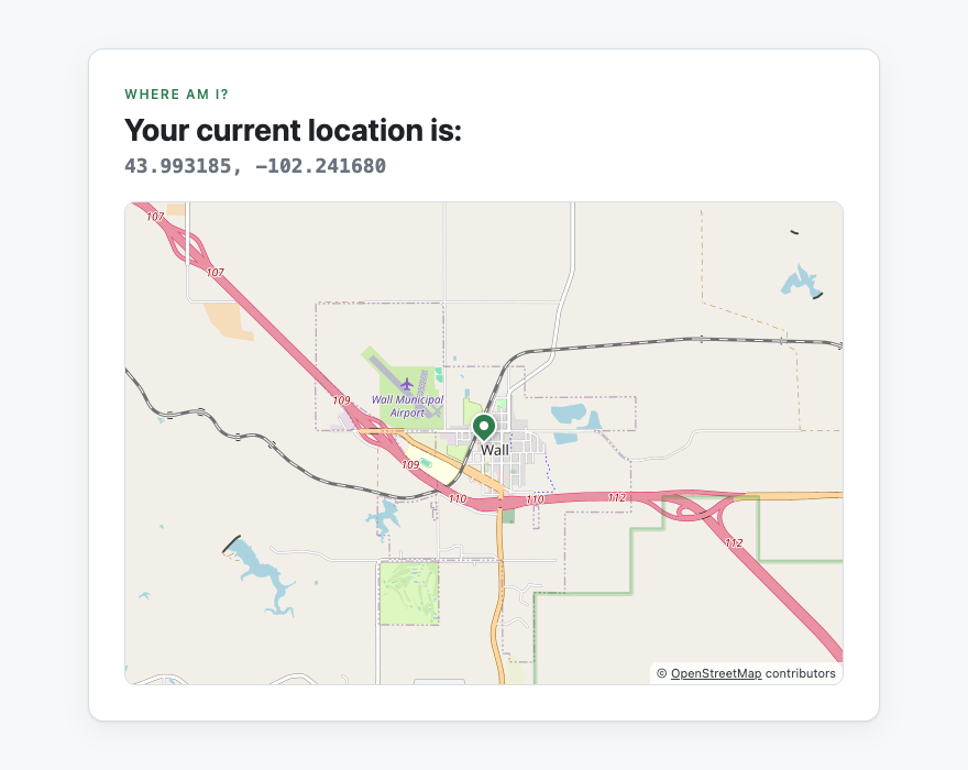 A map centered on Wall, South Dakota, with a pin and the reported coordinates above it